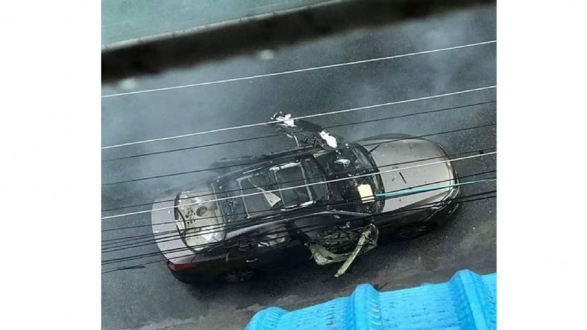 Car explodes near UN office and a highschool, injures at least one