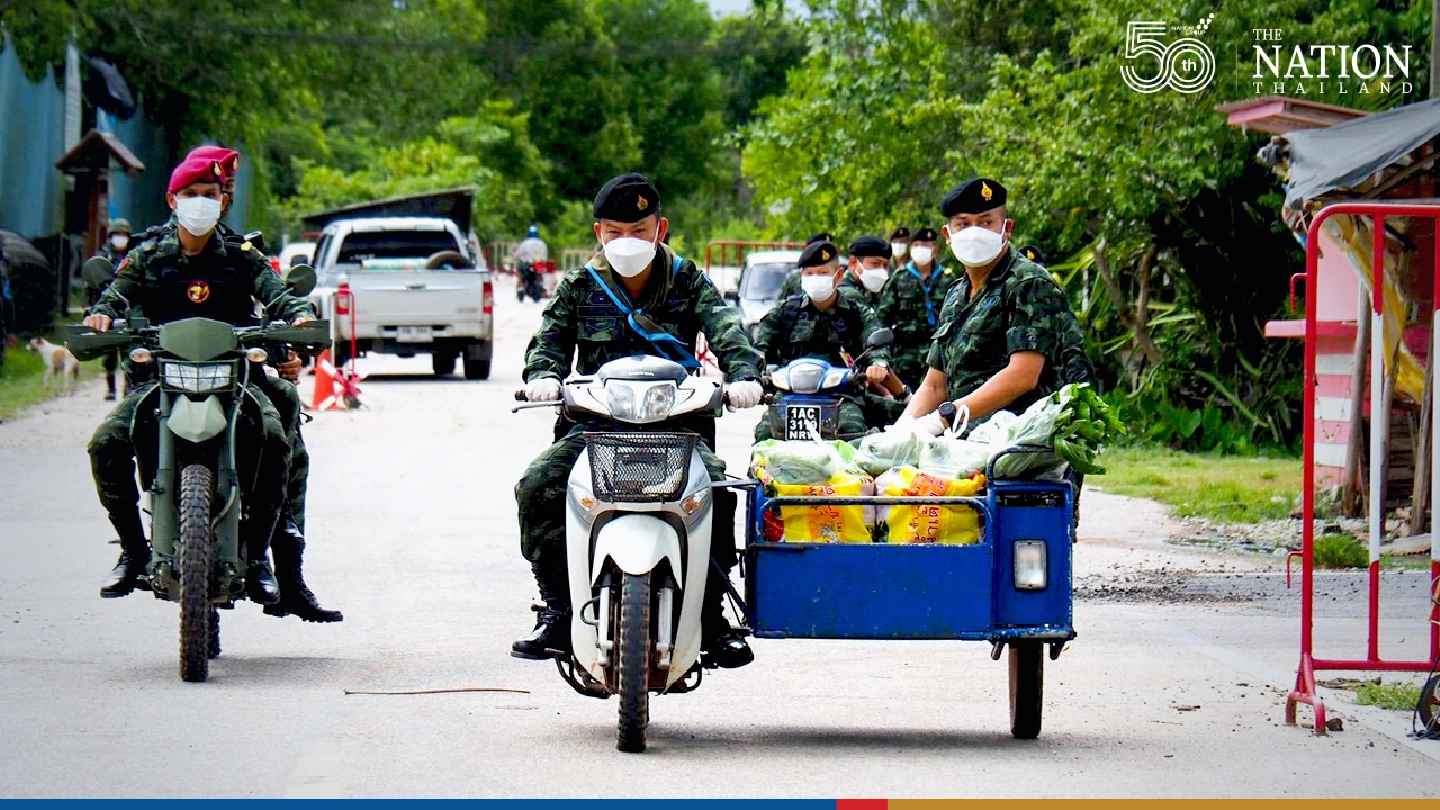 ‘Caring’ soldiers troop into Narathiwat community to hand out vegetables