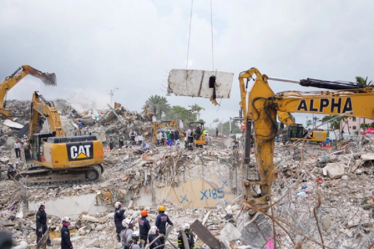 Victim search ends in U.S. Florida building collapse killing at least 97 Victim search ends in U.S. Florida building collapse killing at least 97