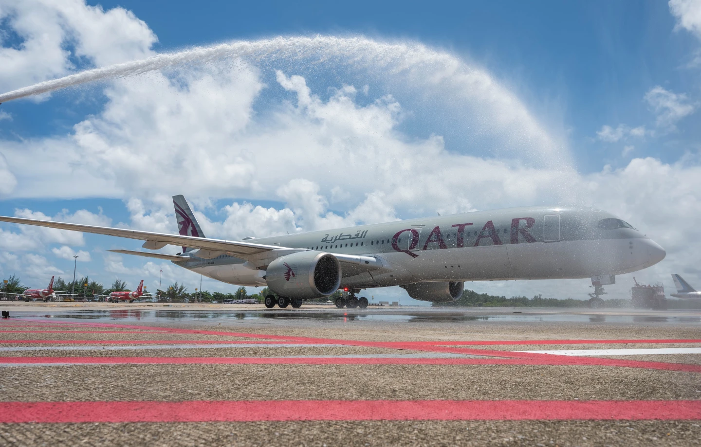 Qatar Airways Touches Down in Phuket with a Traditional Water Cannon Salute as the Famed Holiday Getaway Reopens To International Tourism Qatar Airways Touches Down in Phuket with a Traditional Water Cannon Salute as the Famed Holiday Getaway Reopens To International Tourism