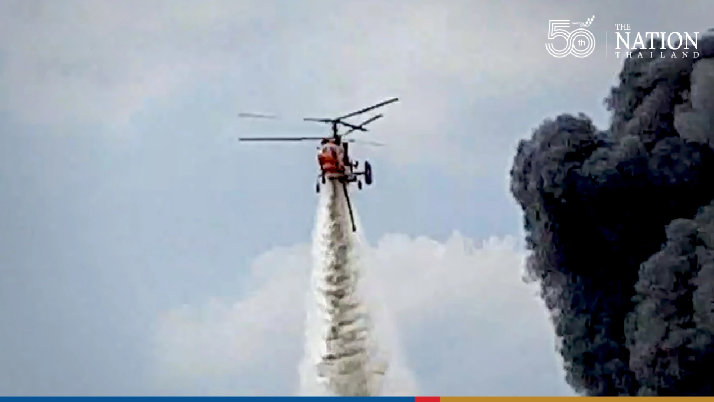 Helicopters fight flames from Bang Phli factory blast Helicopters fight flames from Bang Phli factory blast