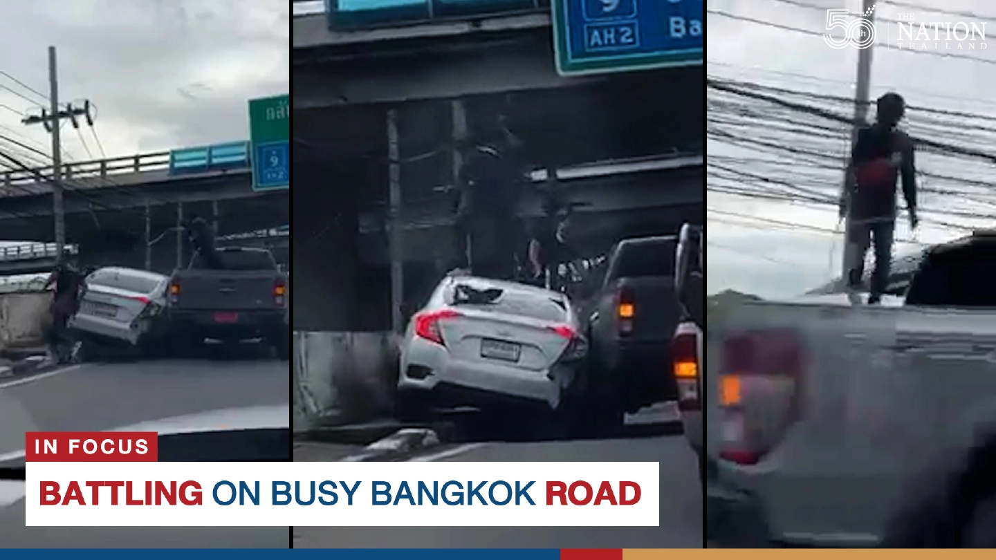 Battling on busy Bangkok road