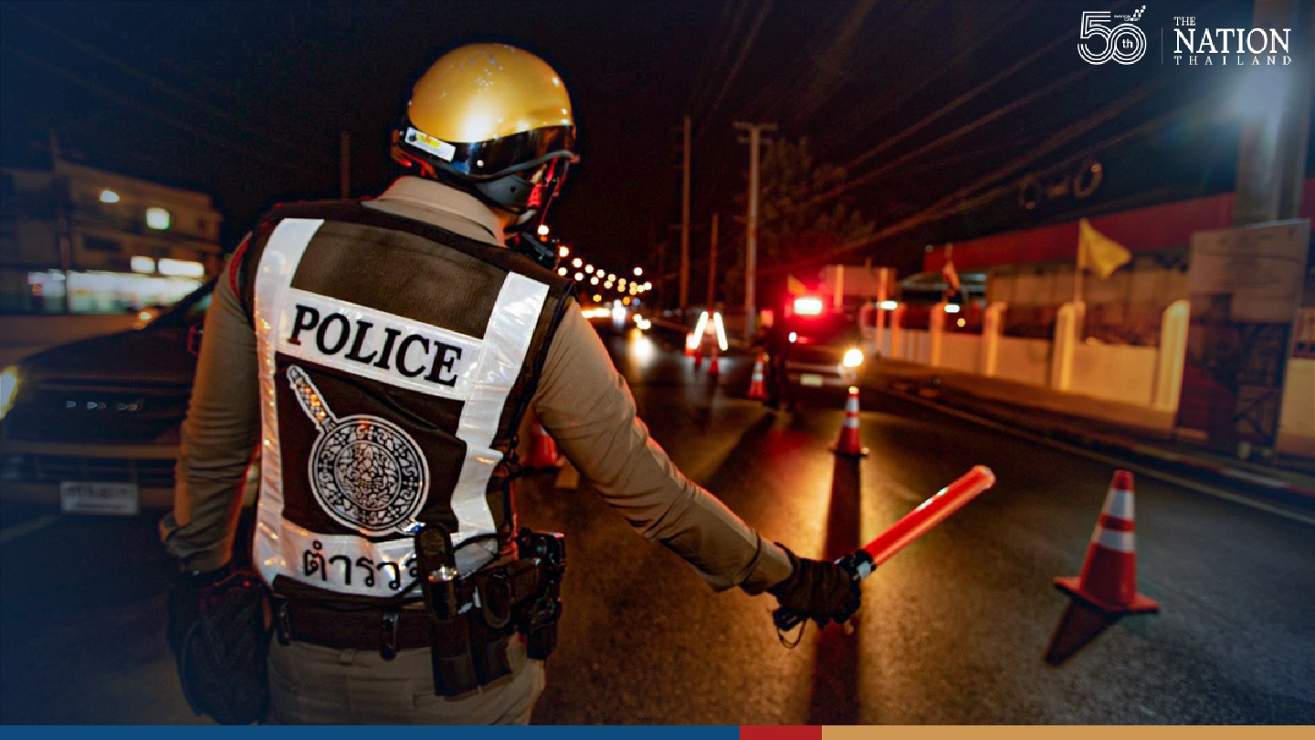 Police set up checkpoints as night curfew begins in Bangkok Police set up checkpoints as night curfew begins in Bangkok