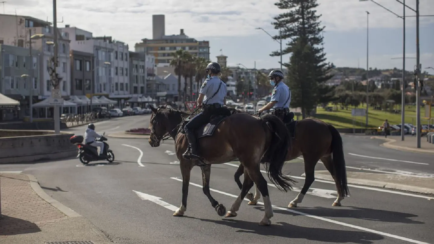 Calls for curfew, more curbs in Sydney as delta outbreak worsens