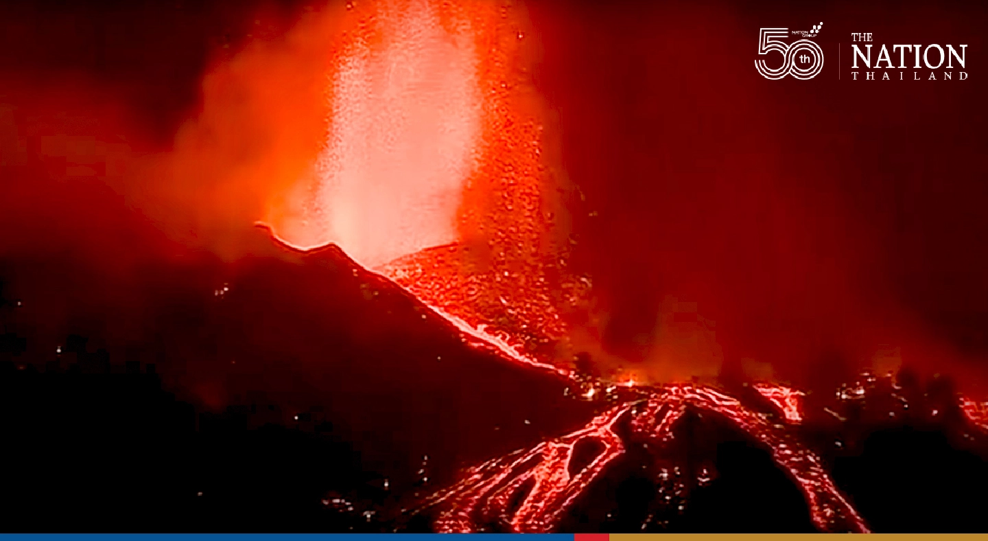 Thousands flee La Palma volcano eruption as rivers of lava flow towards villages