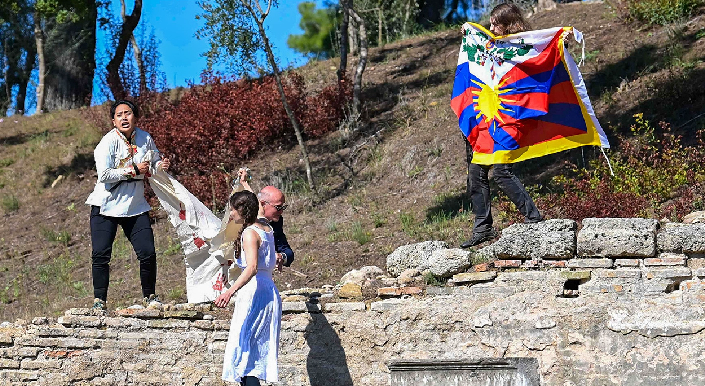 Protesters targeting Chinas human rights record disrupt Olympic torch-lighting ceremony in Greece Protesters targeting Chinas human rights record disrupt Olympic torch-lighting ceremony in Greece