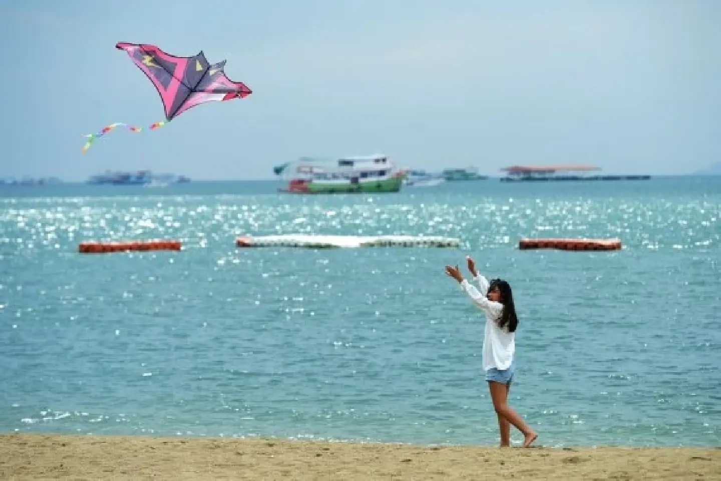 Tourists visit Pattaya beach as Thailand reopens to vaccinated visitors