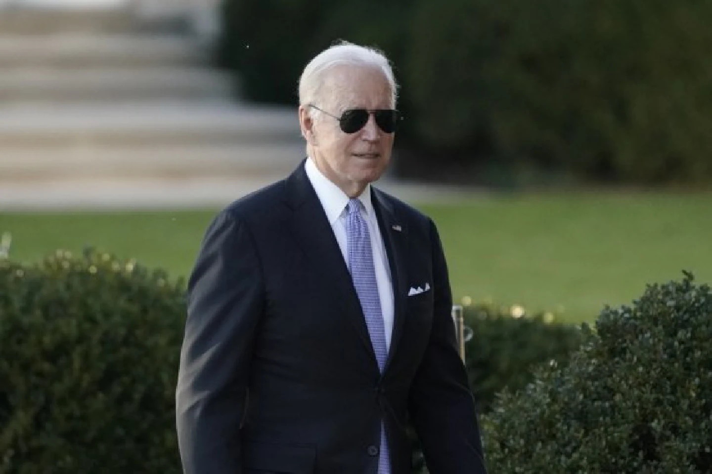 Biden signs infrastructure bill into law after months of delay amid Democratic infighting