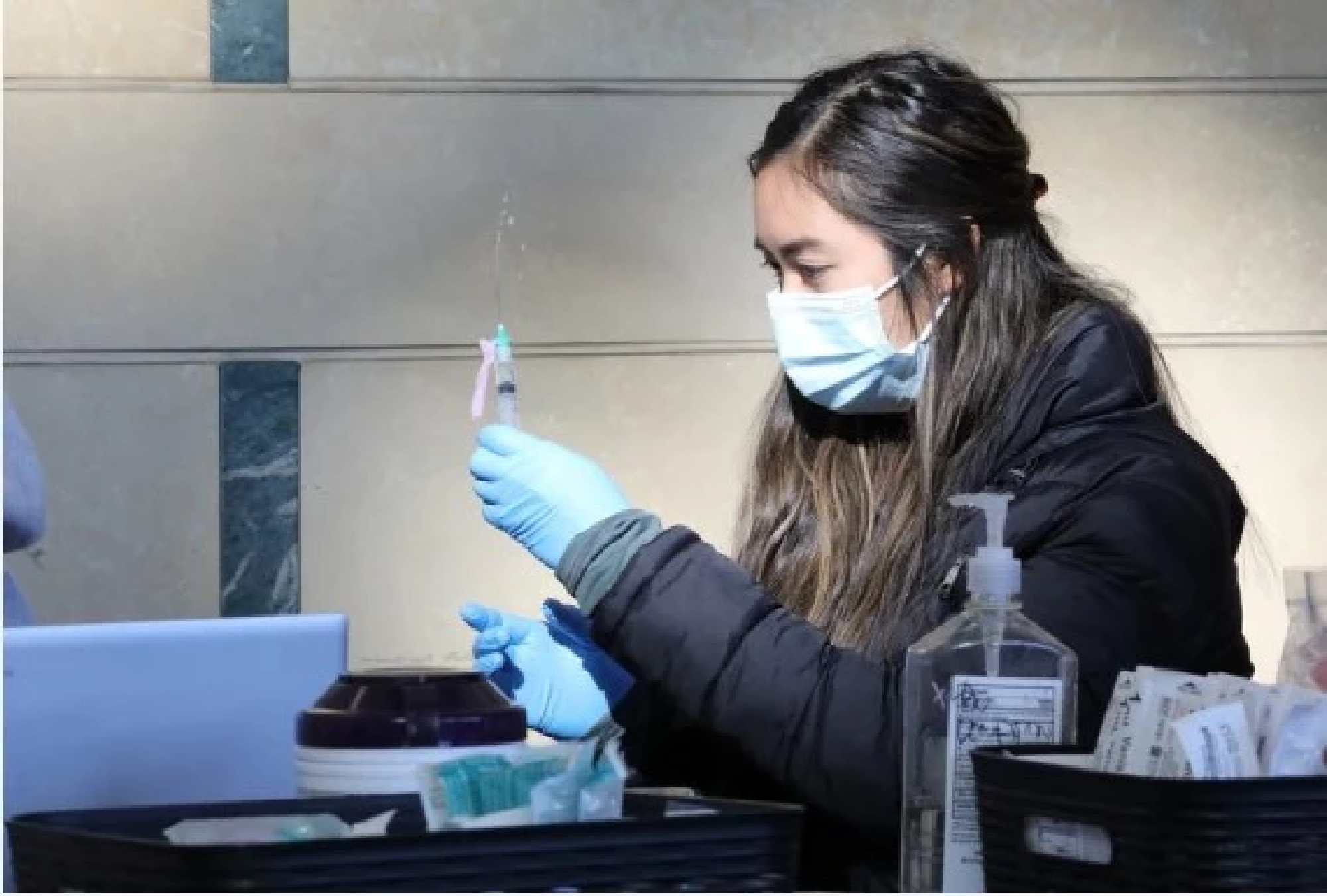 Moderna says its COVID-19 booster appears effective against Omicron