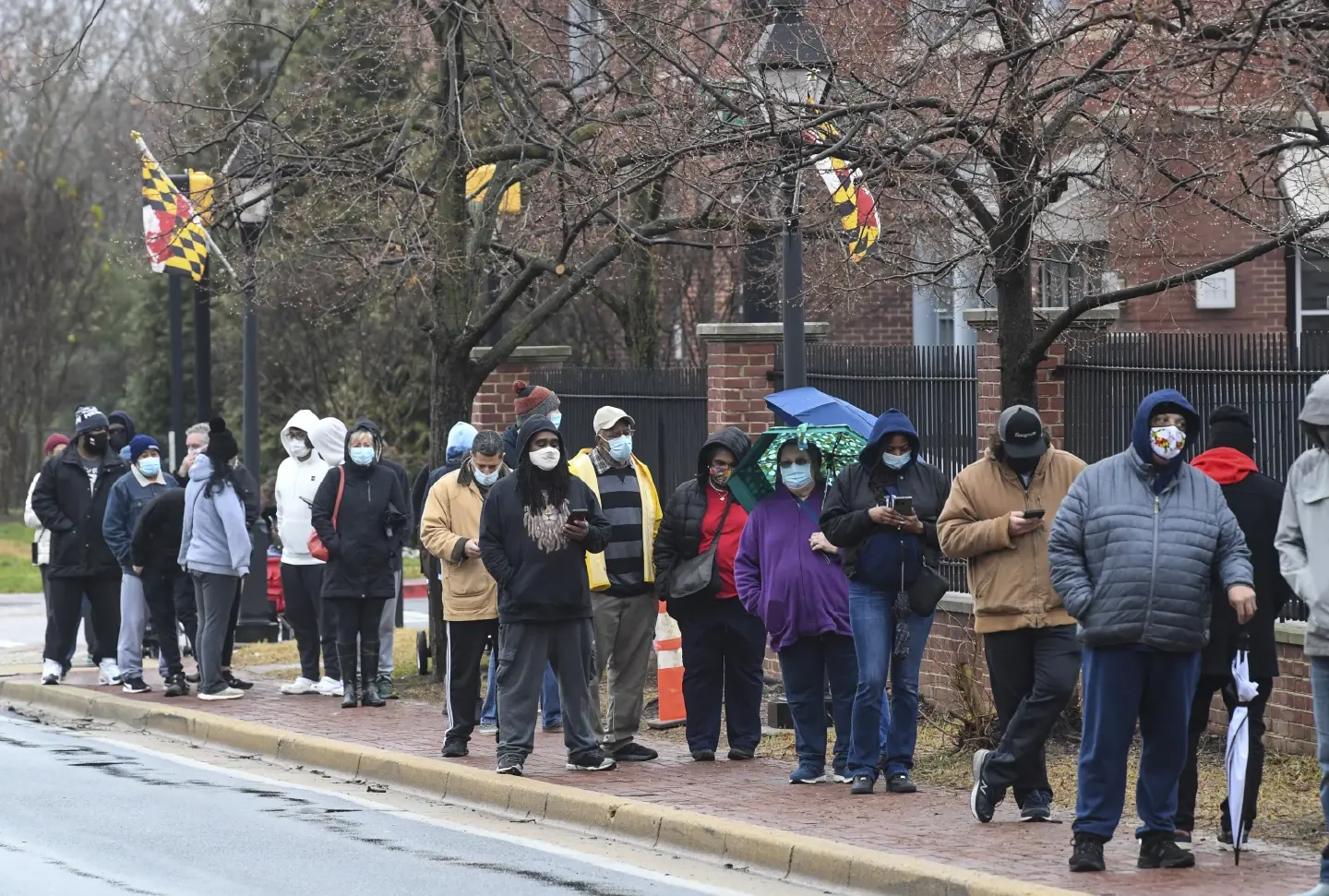 Crazy omicron surge could peak soon, but the virus is unpredictable as the pandemic enters its third year