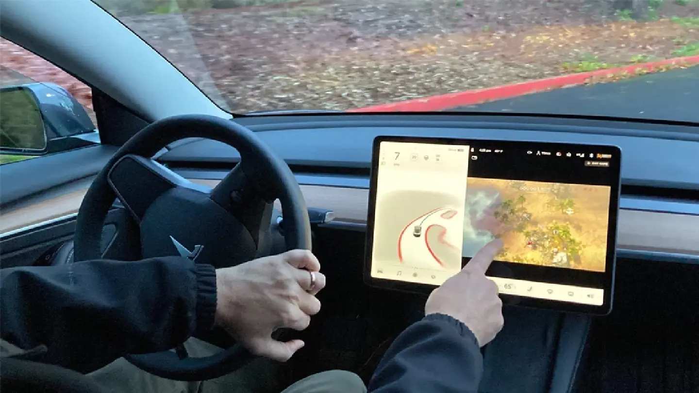 Tesla halts use of video games in moving cars amid safety probe Tesla halts use of video games in moving cars amid safety probe