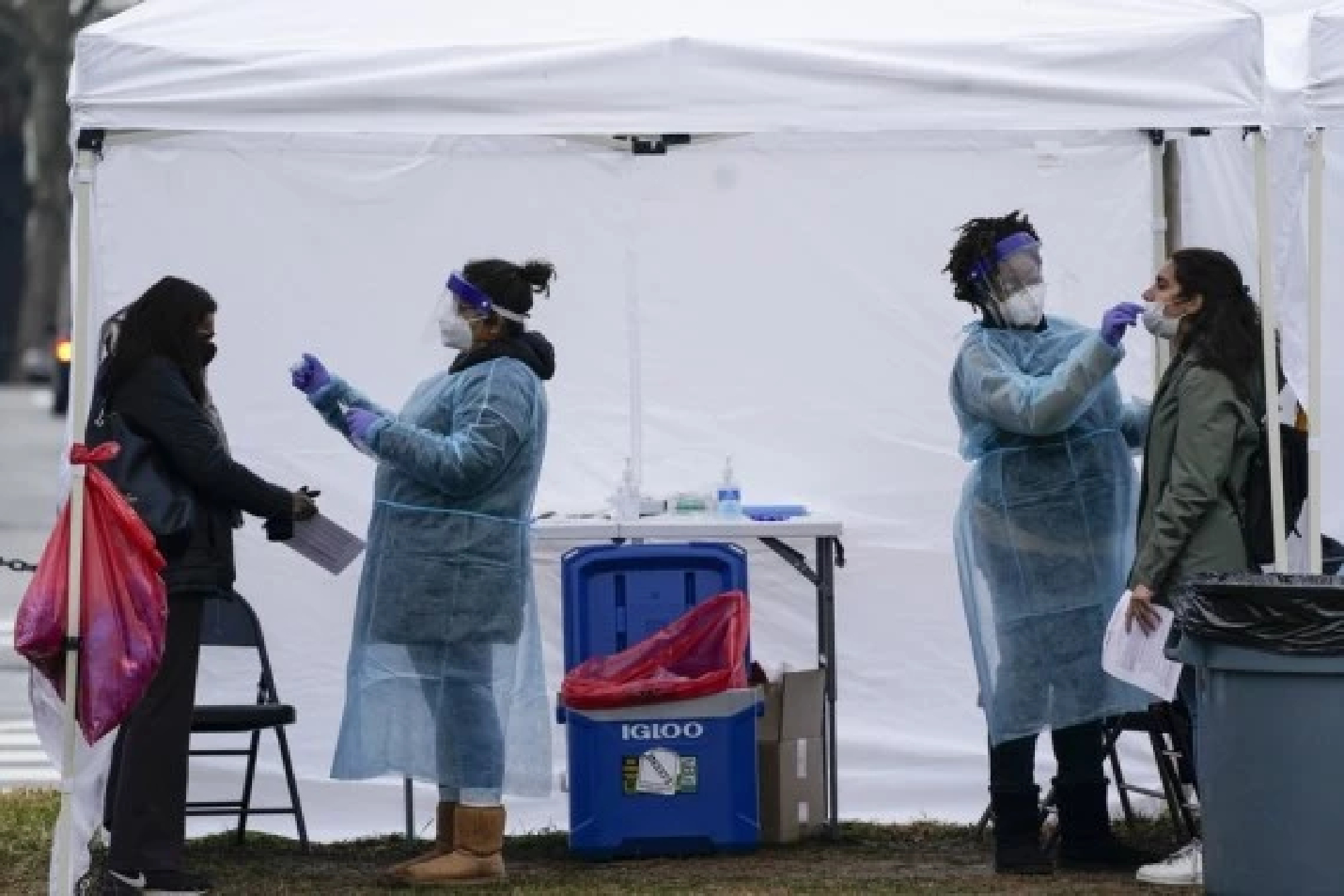 U.S. knee-deep in pandemic chaos as New Year rung in