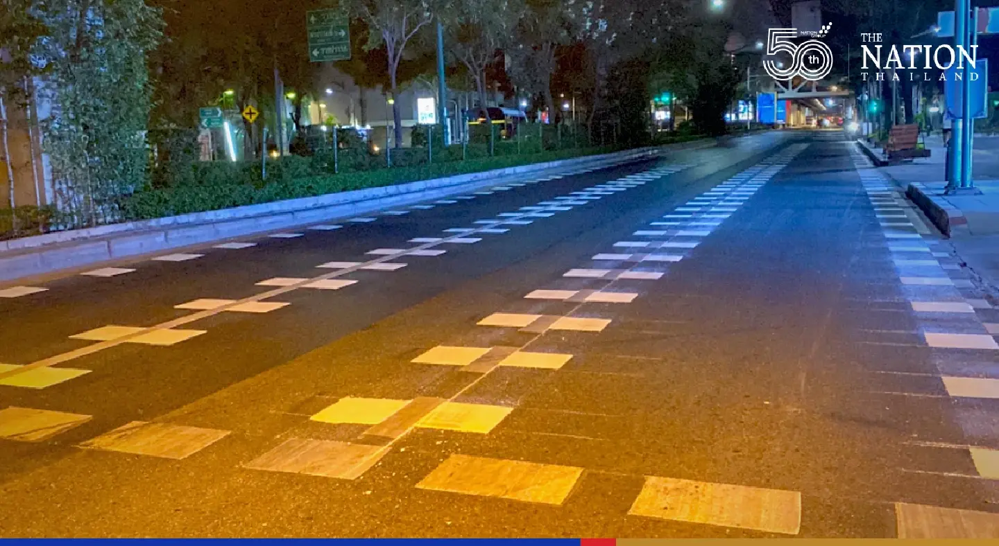 Fresh traffic markings ahead of zebra crossing where doctor was killed