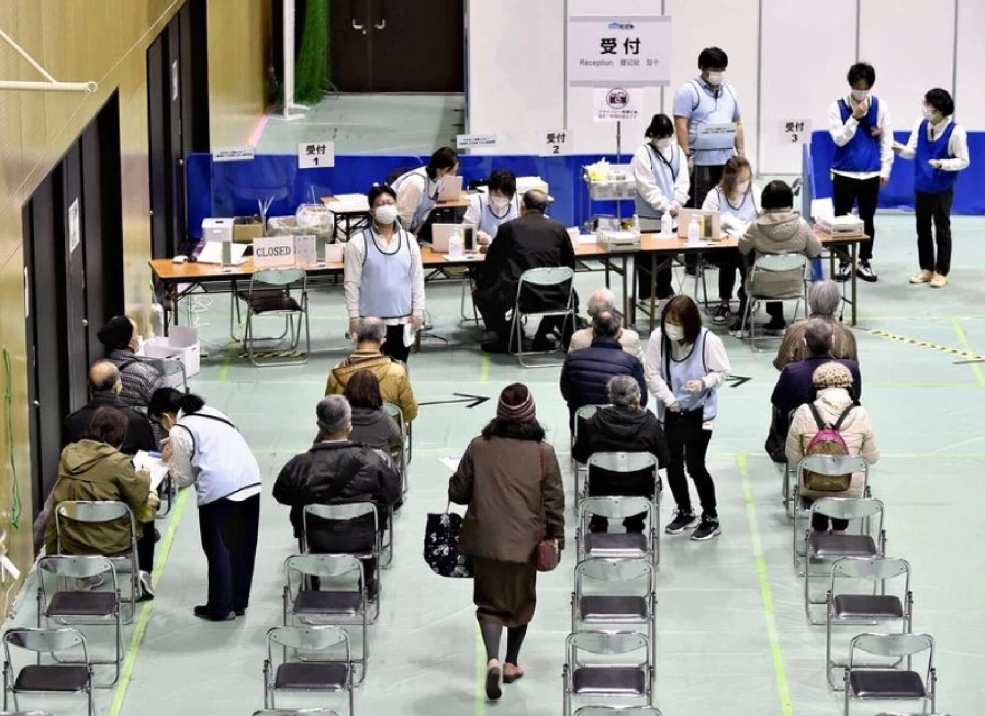 Japan expedites booster schedule for all eligible residents