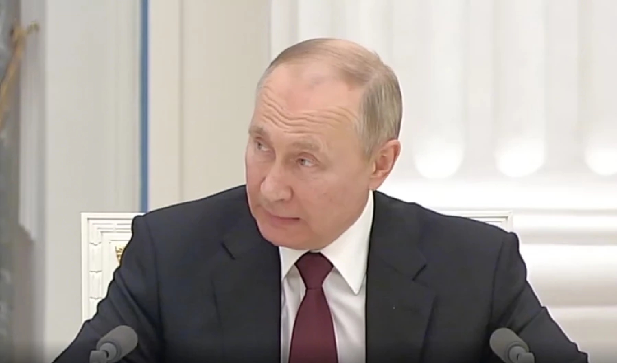 Putin signs decrees recognizing two "independent republics" in east Ukraine's Donbass