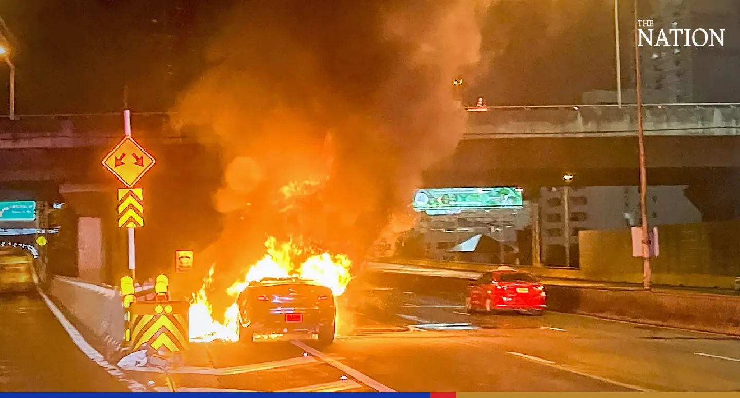 Flaming Jaguar car sparks police investigation in Bangkok Flaming Jaguar car sparks police investigation in Bangkok