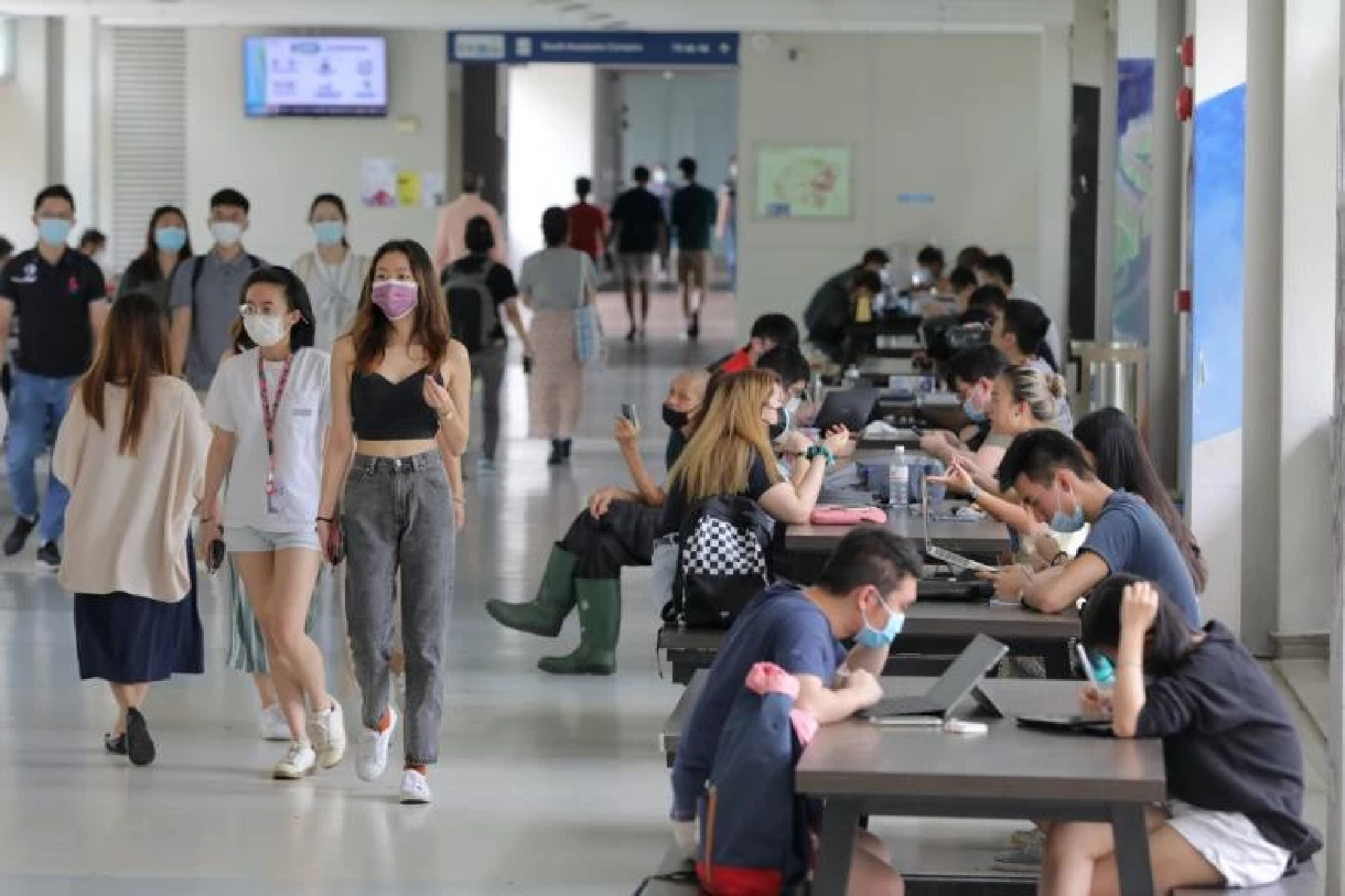 Universities in Singapore take Covid-19 precautions as students head overseas to study and work