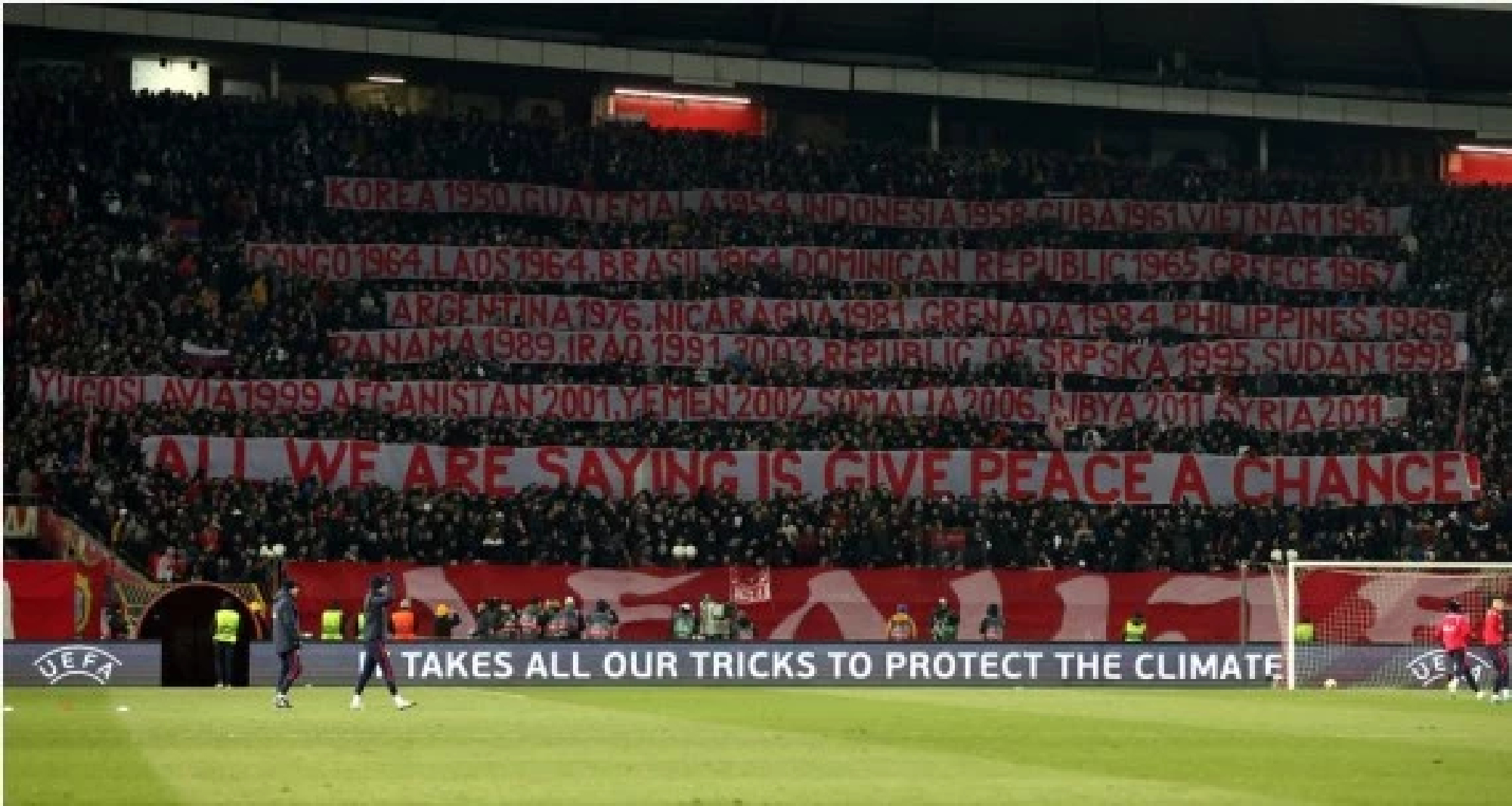 Serbian football fans list U.S.-led NATO interventions with banners