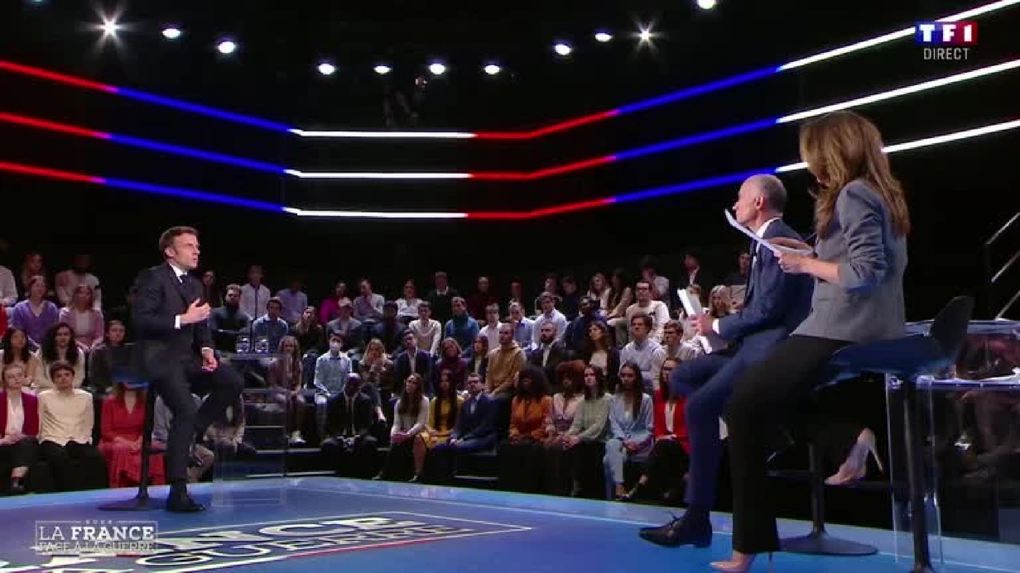 France's Macron defends Russia sanctions, opponents warn of consequences