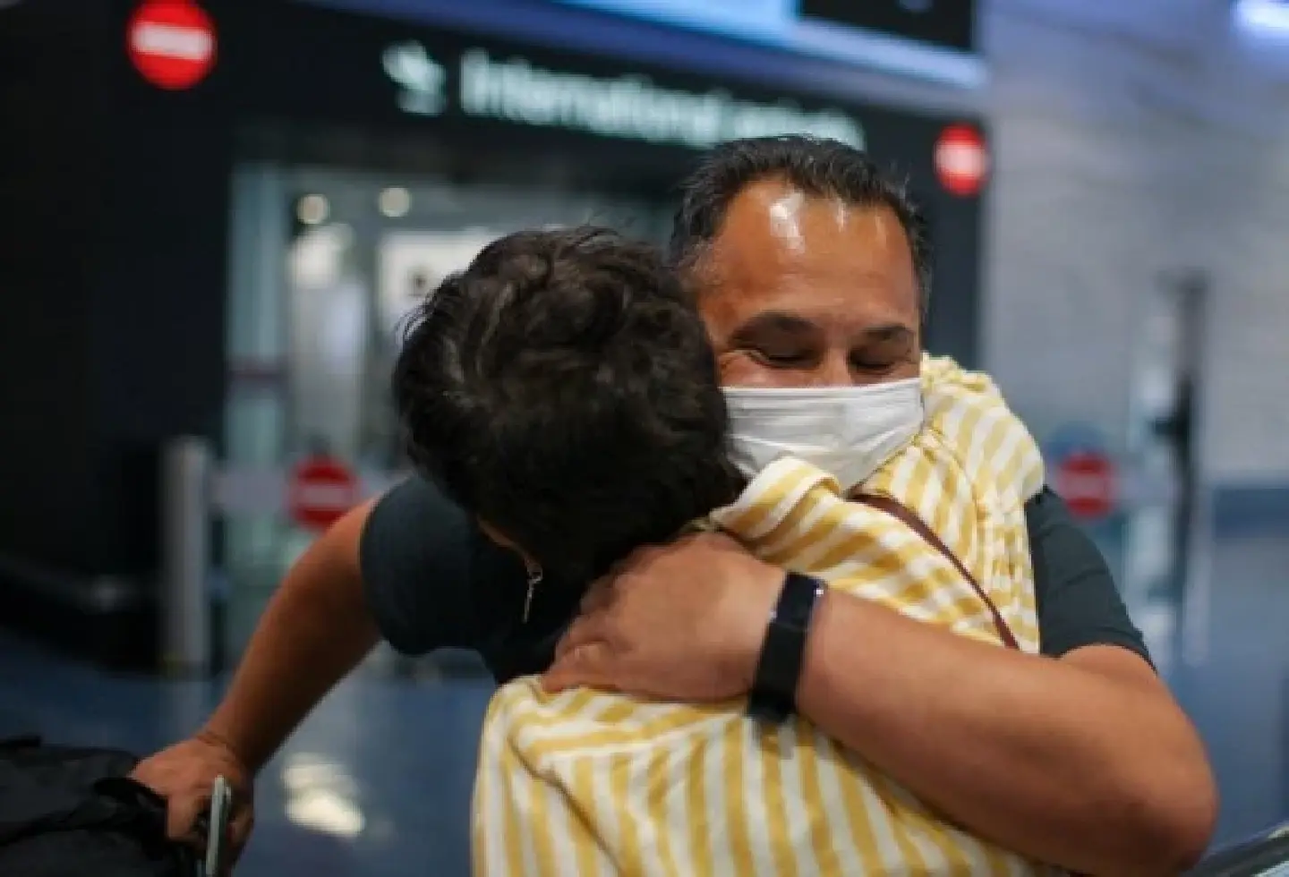 New Zealand opens borders with tears, hugs