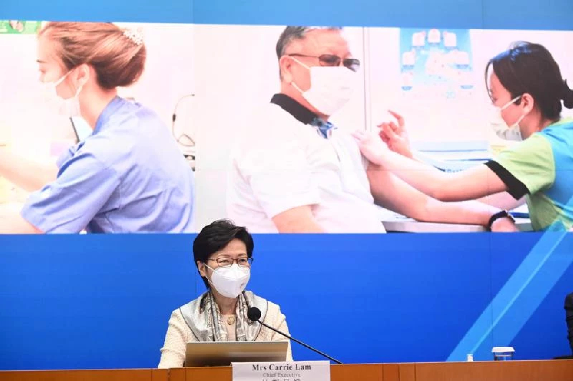 HK suspends mass testing plan, lifts flight ban