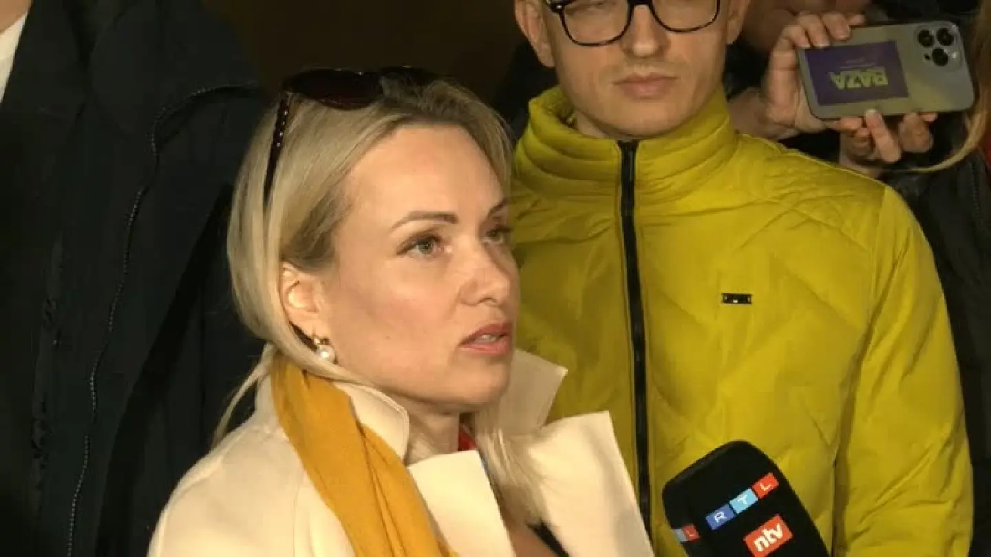Russian court fines woman after on-air TV protest Russian court fines woman after on-air TV protest
