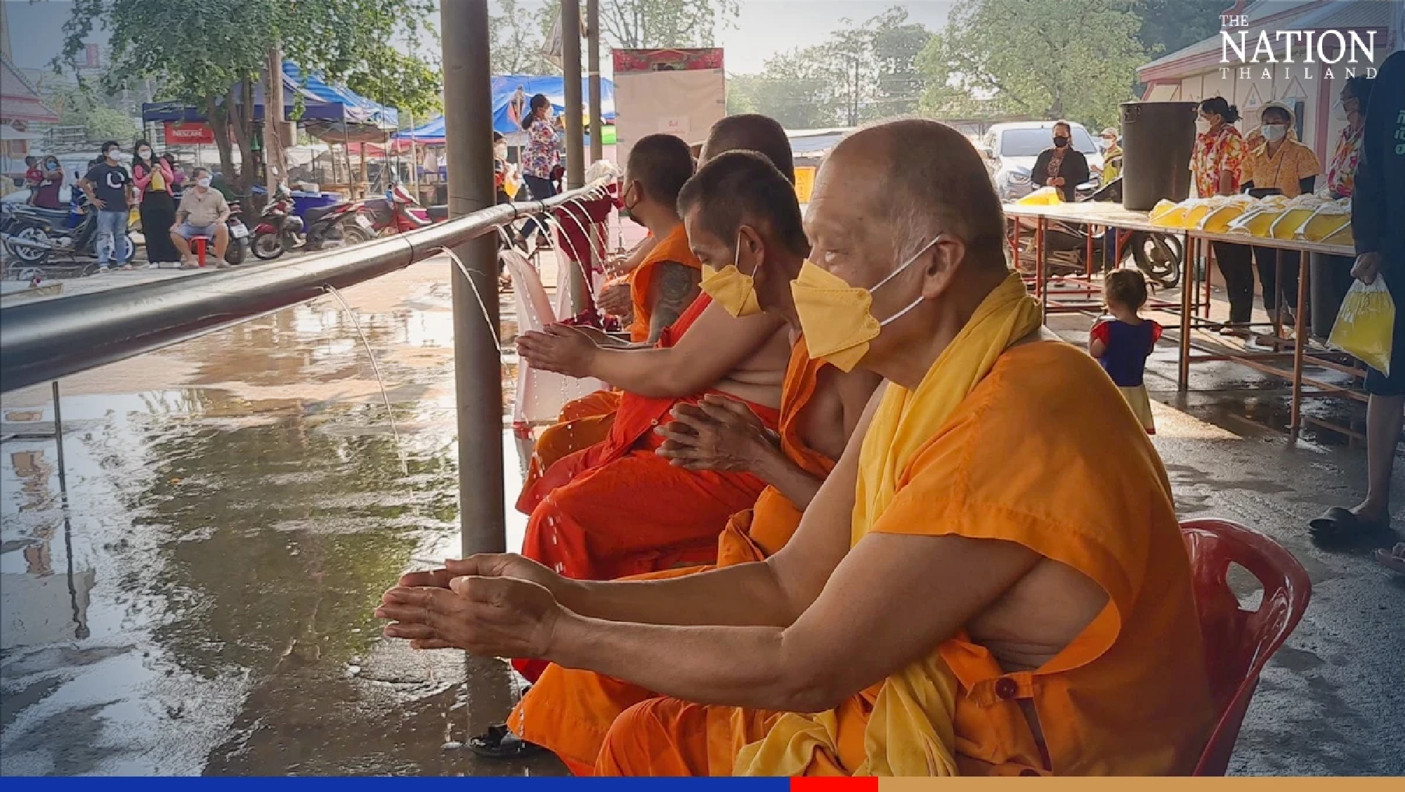 Sukhothai temple finds ingenious way of Covid-proofing Songkran ritual