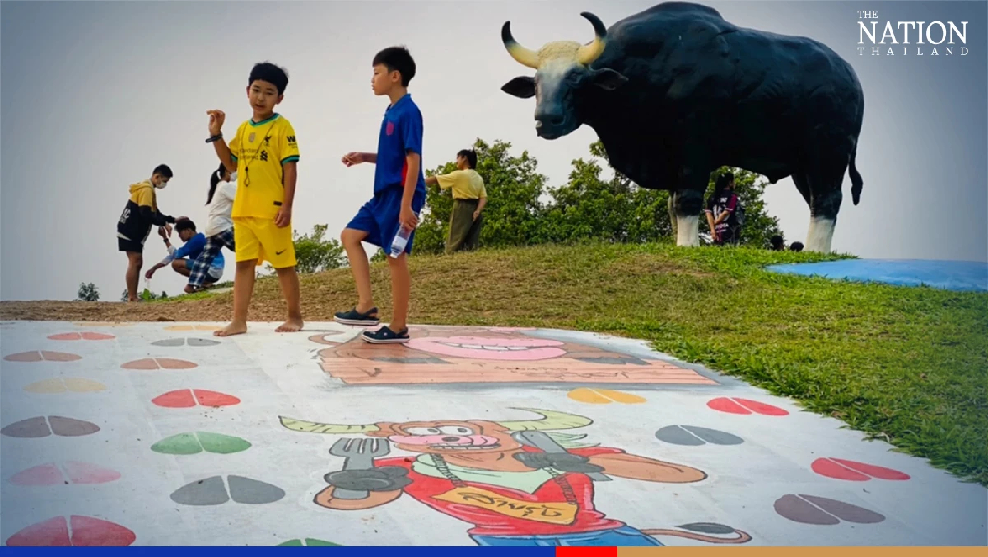 Street art and wild oxen attract tourists to Wang Nam Khiao