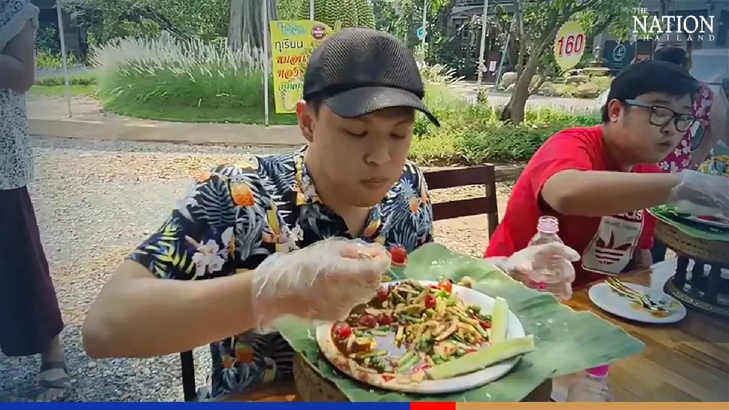 Chiang Mai restaurant proves a hot draw with durian spicy salad eating contest Chiang Mai restaurant proves a hot draw with durian spicy salad eating contest