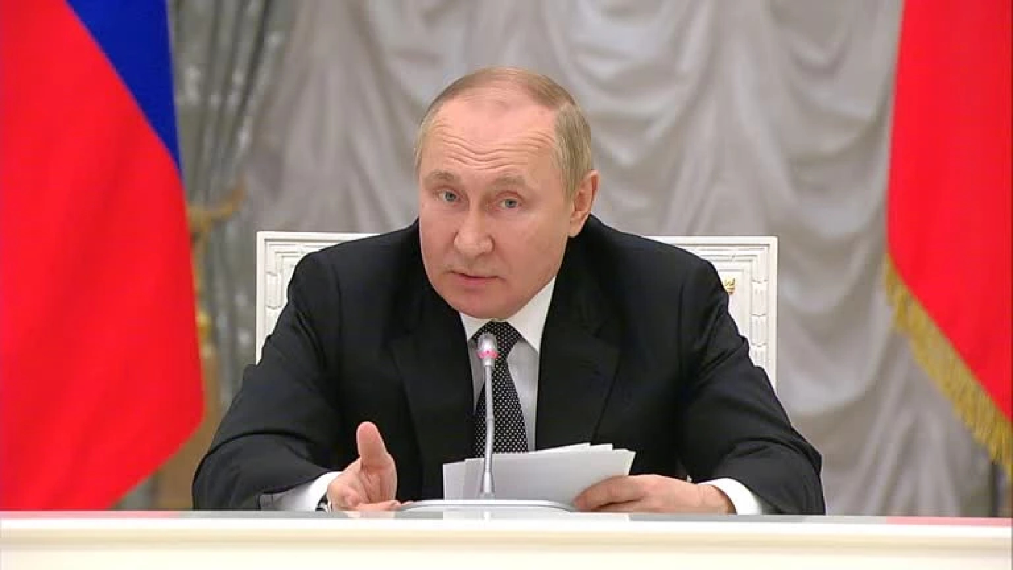 Putin hikes Russian pensions, plays down Ukraine impact on economy