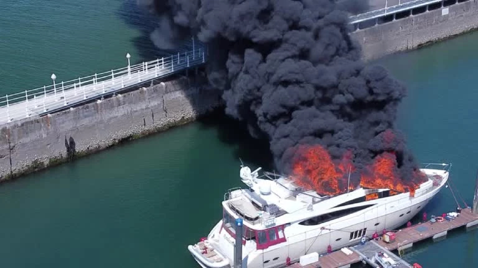 Multi-million pound superyacht goes up in flames on English coast