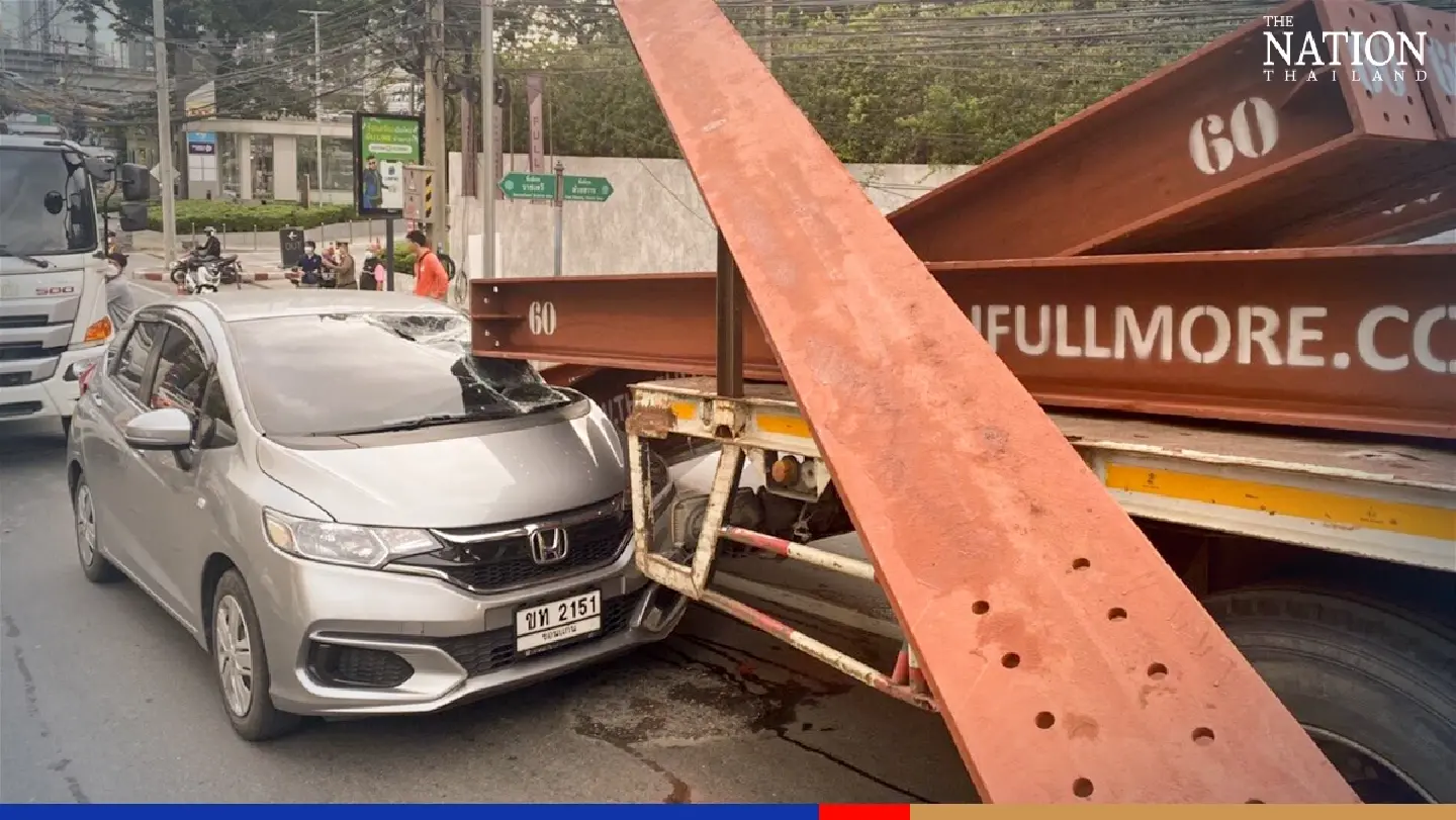 Car driver escapes uninjured as steel beam falls on windscreen