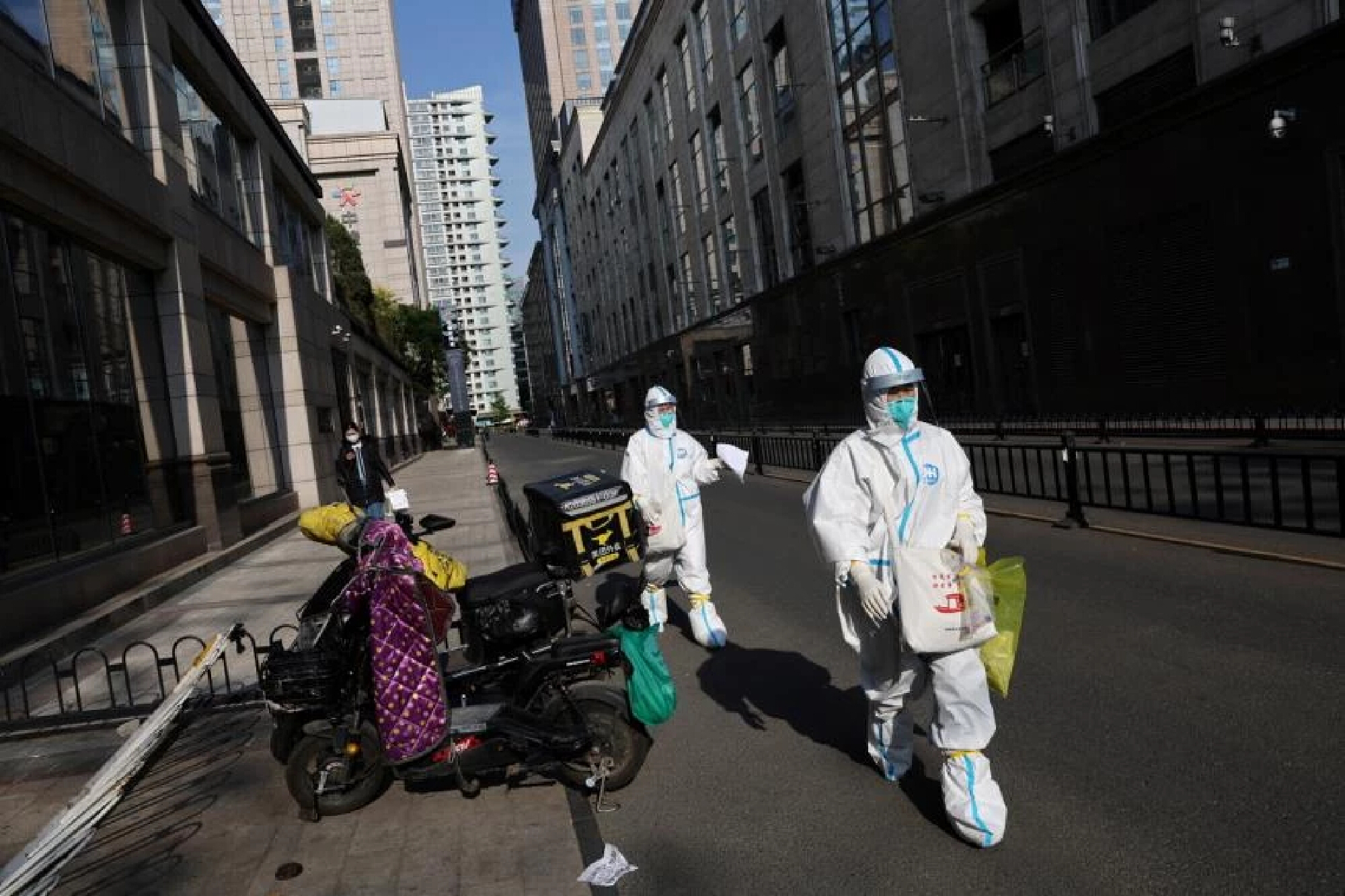 Beijing further tightens Covid-19 curbs; residents say restrictions amount to de facto lockdown
