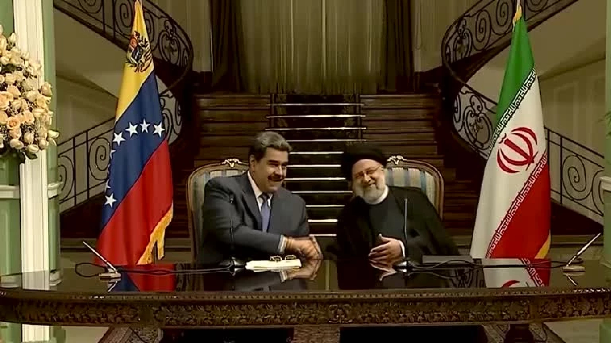 Under U.S. sanctions, Iran and Venezuela sign 20-year cooperation plan