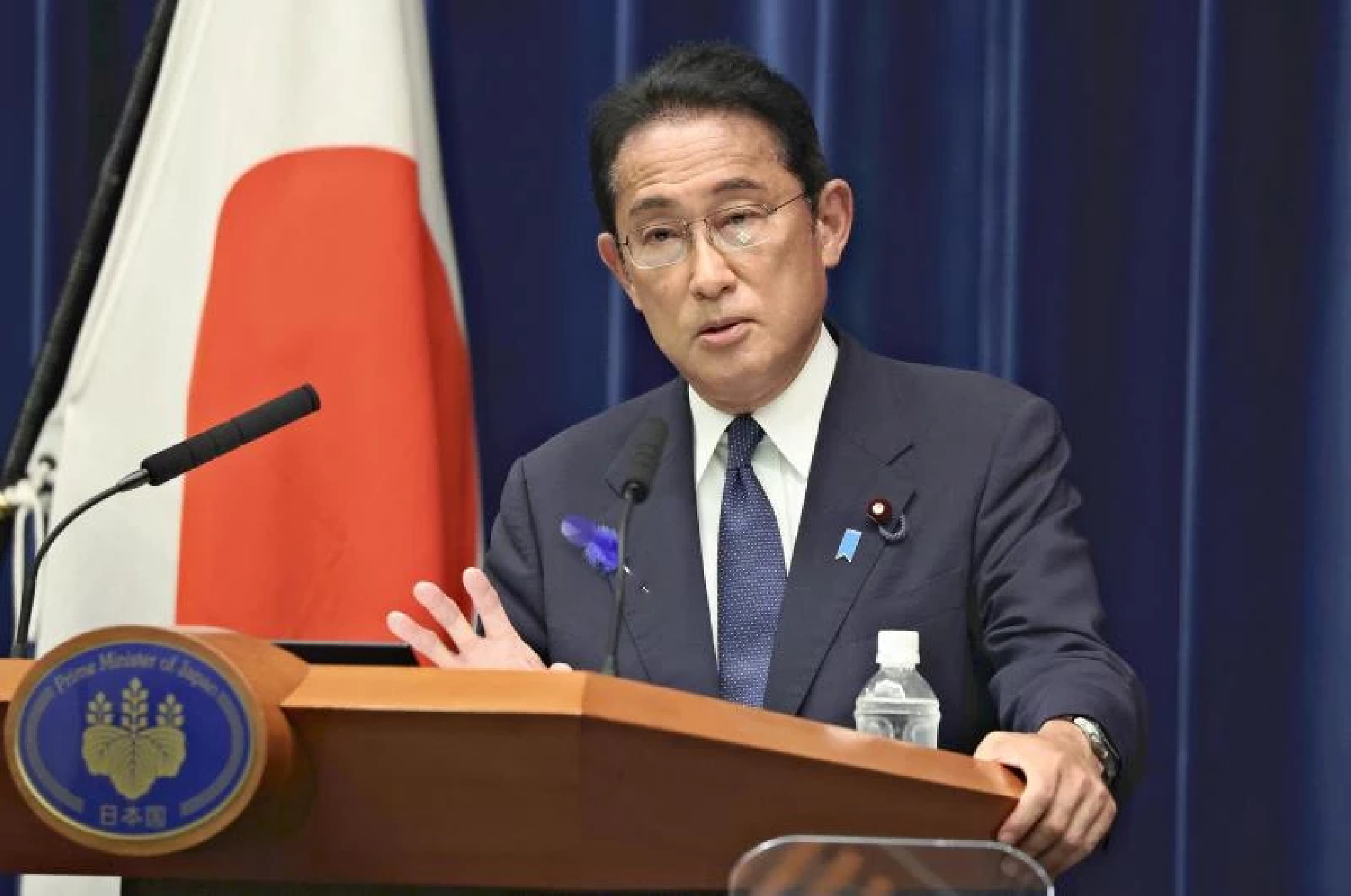 Kishida holds back on activity restrictions — for now