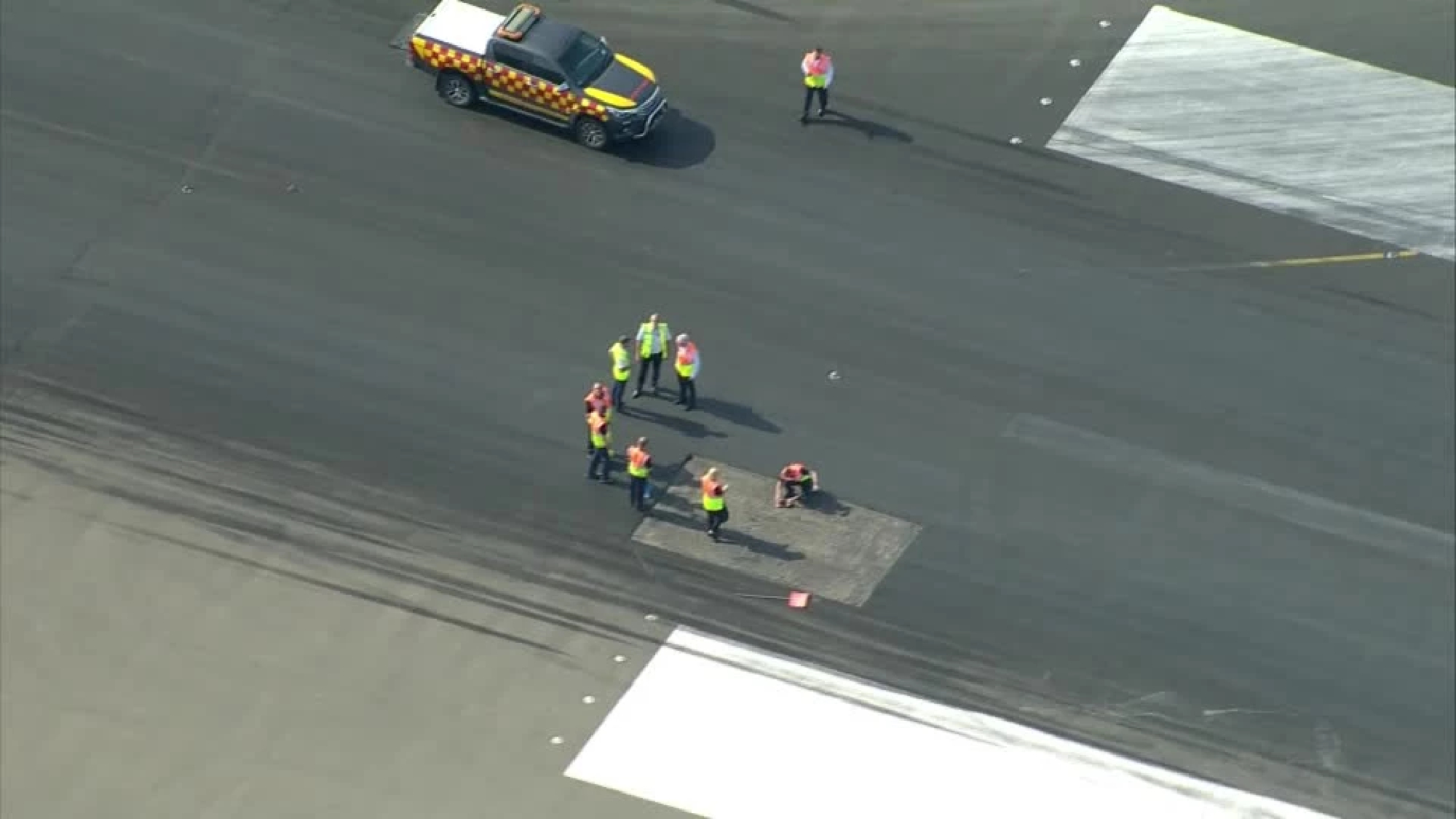 Melting tarmac halts flights at Britain's Luton airport