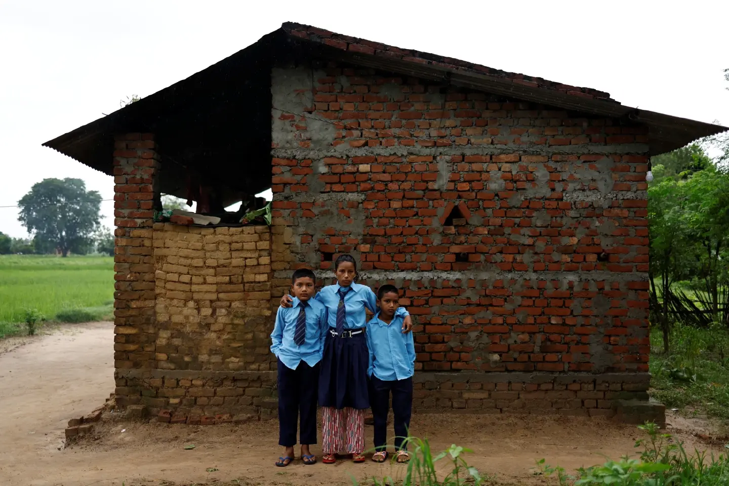 Nepali woman's quest to learn takes her back to school with son