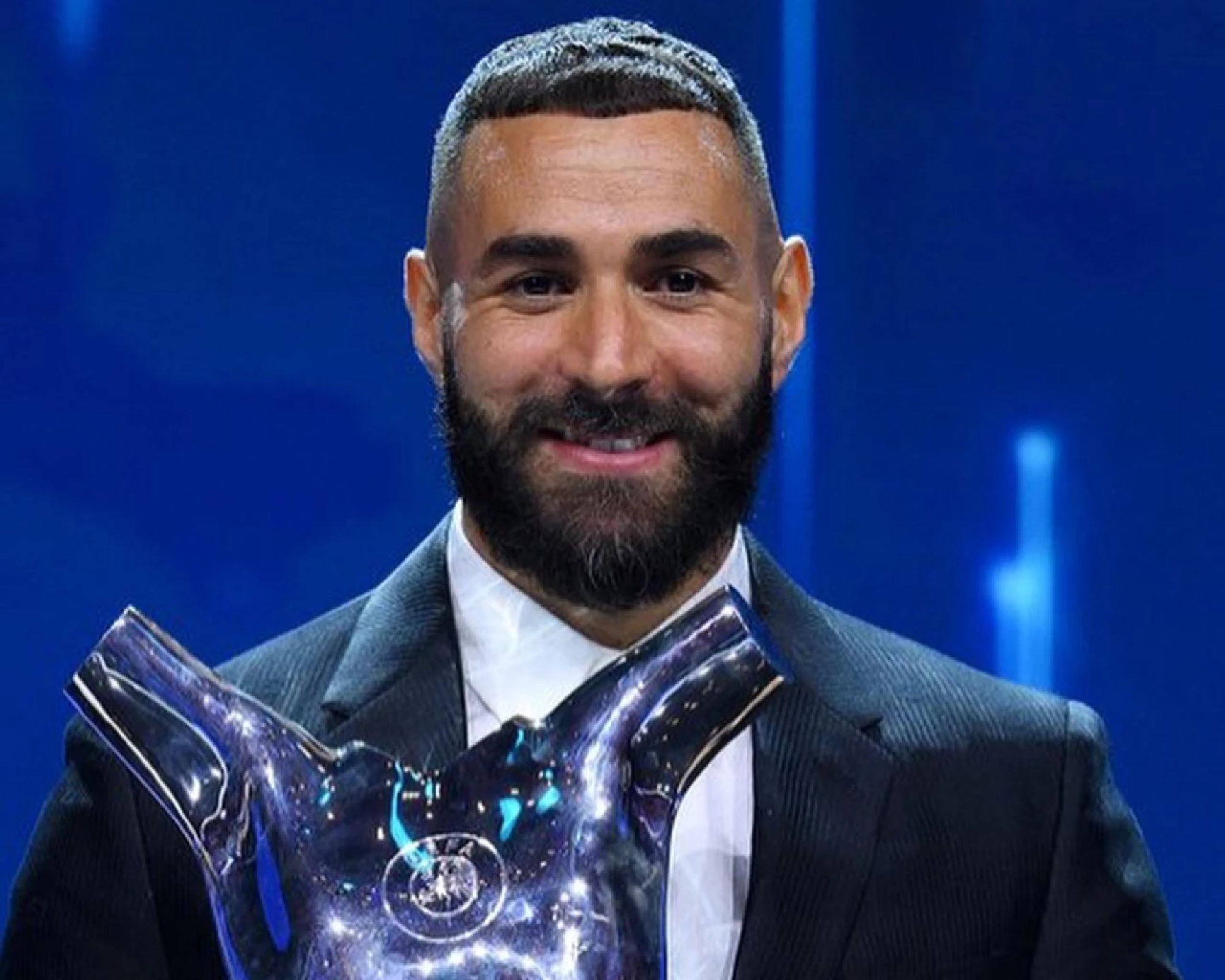 Real's Benzema named UEFA player of year, Ancelotti wins coach's award