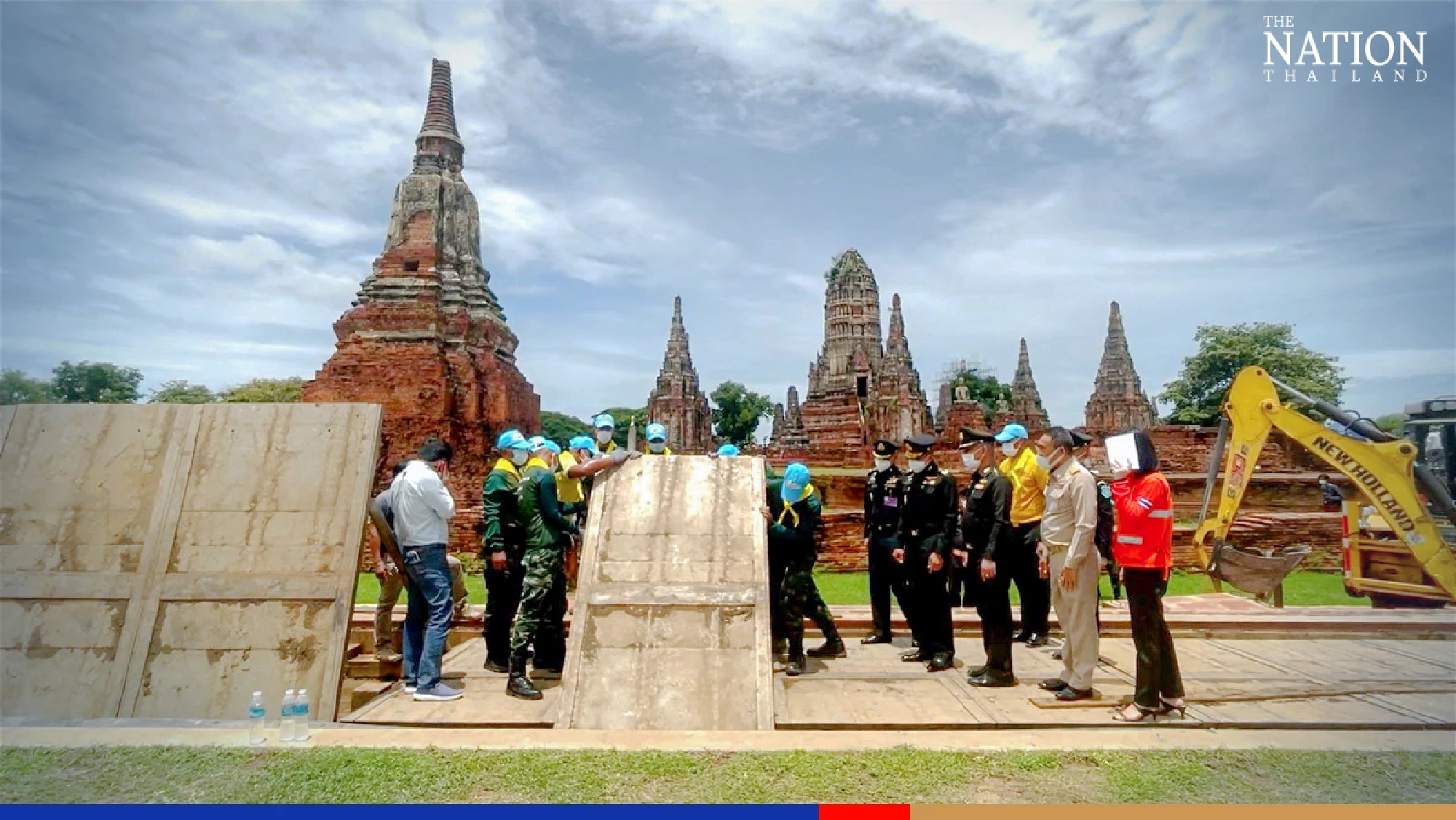 Folding metal ramparts put up around ancient temple in Ayutthaya for protection from flooding