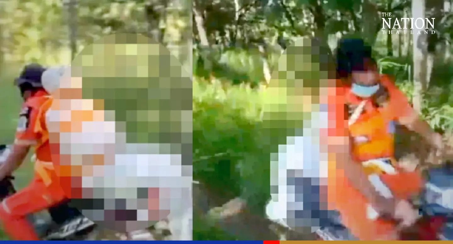 Dramatic clip of rescuer retrieving dead body on bike draws praise
