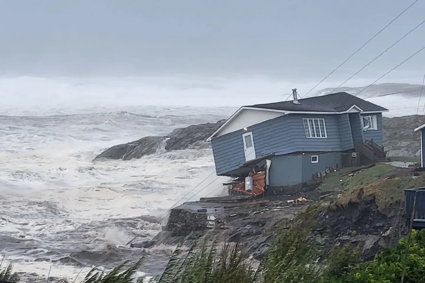 Fiona slams Canada's Atlantic coast, capsizing homes