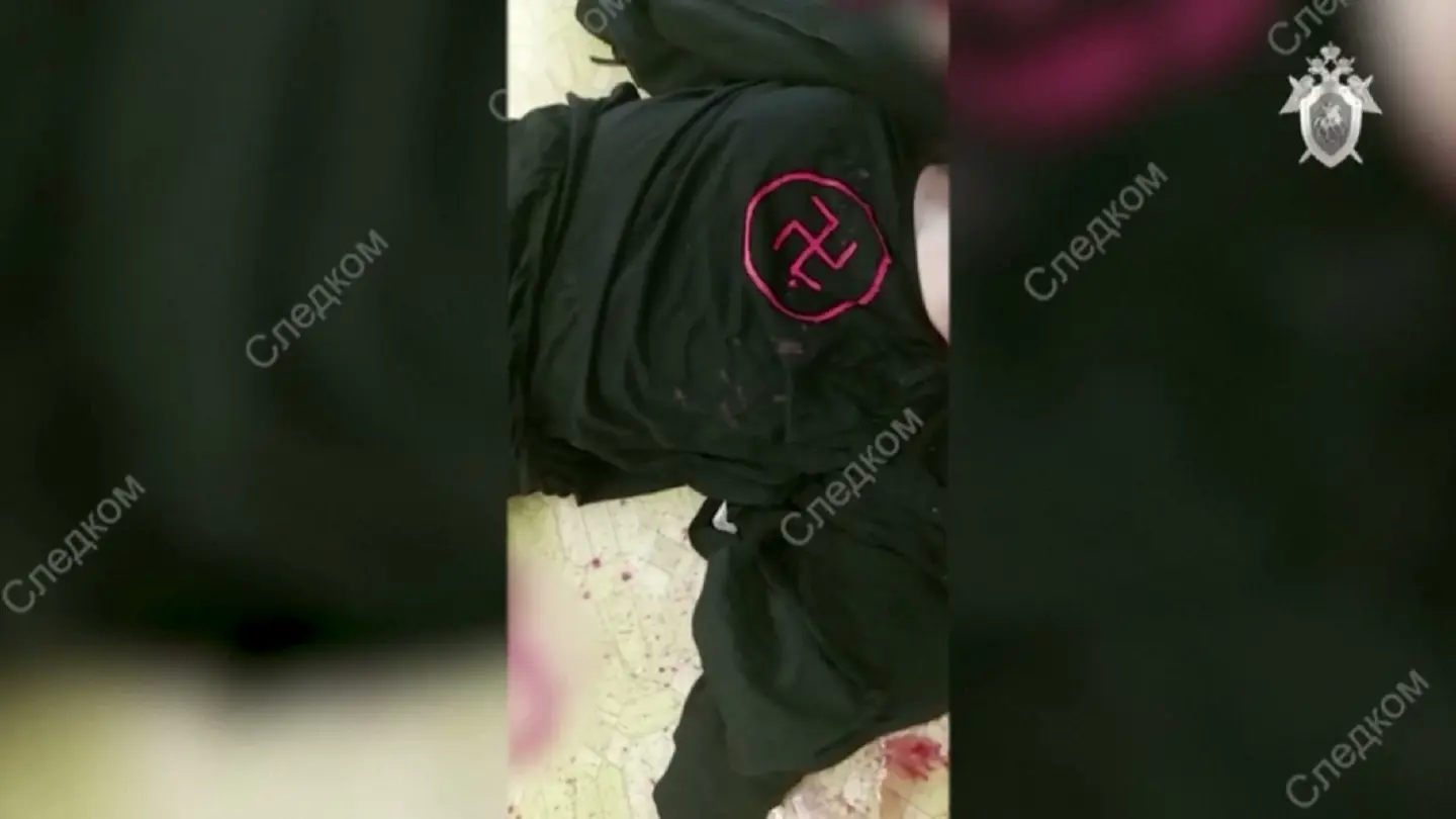 Swastika-wearing gunman kills 13 at Russian school