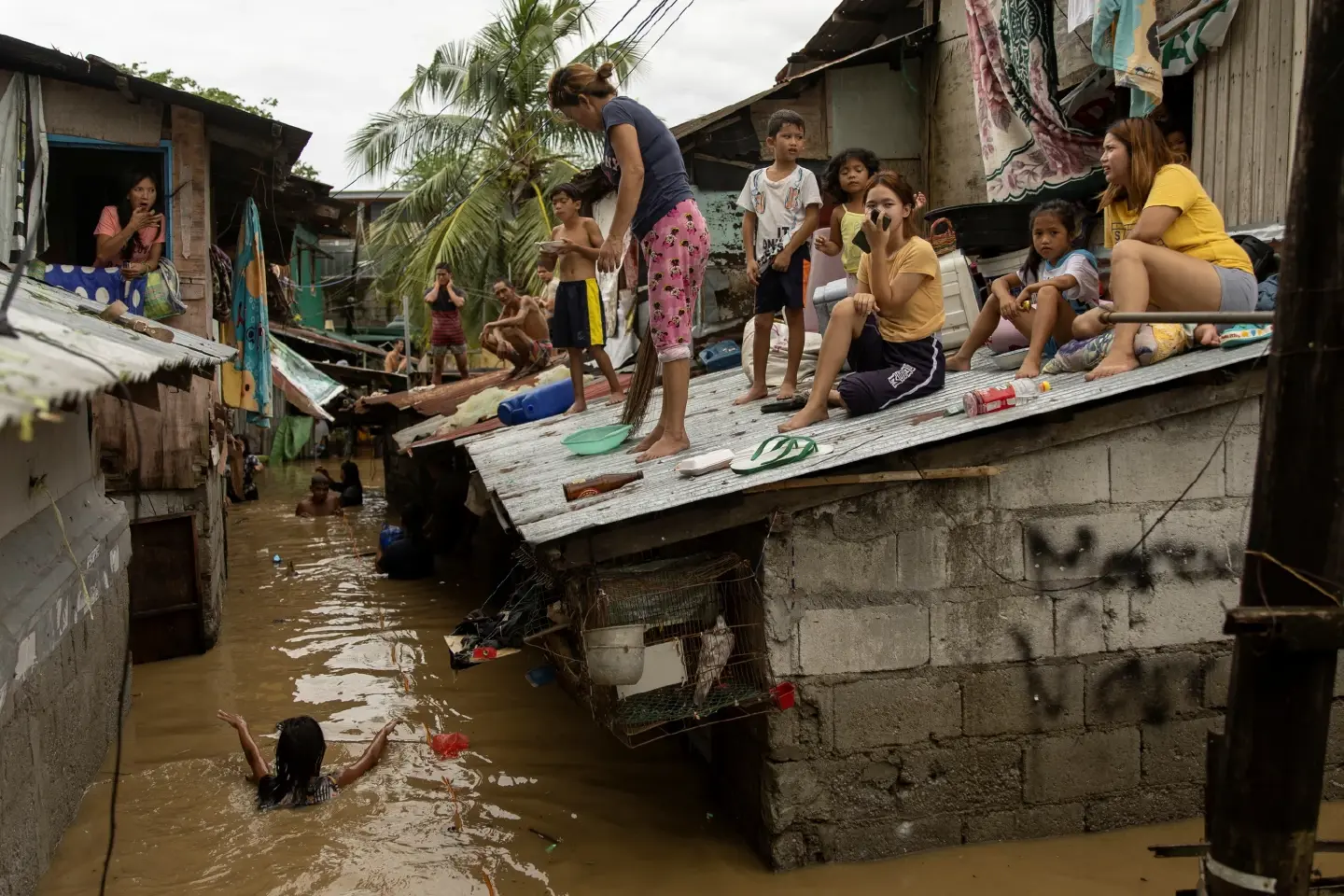 Heavy rains from Typhoon Noru flood houses in northern Philippines Heavy rains from Typhoon Noru flood houses in northern Philippines