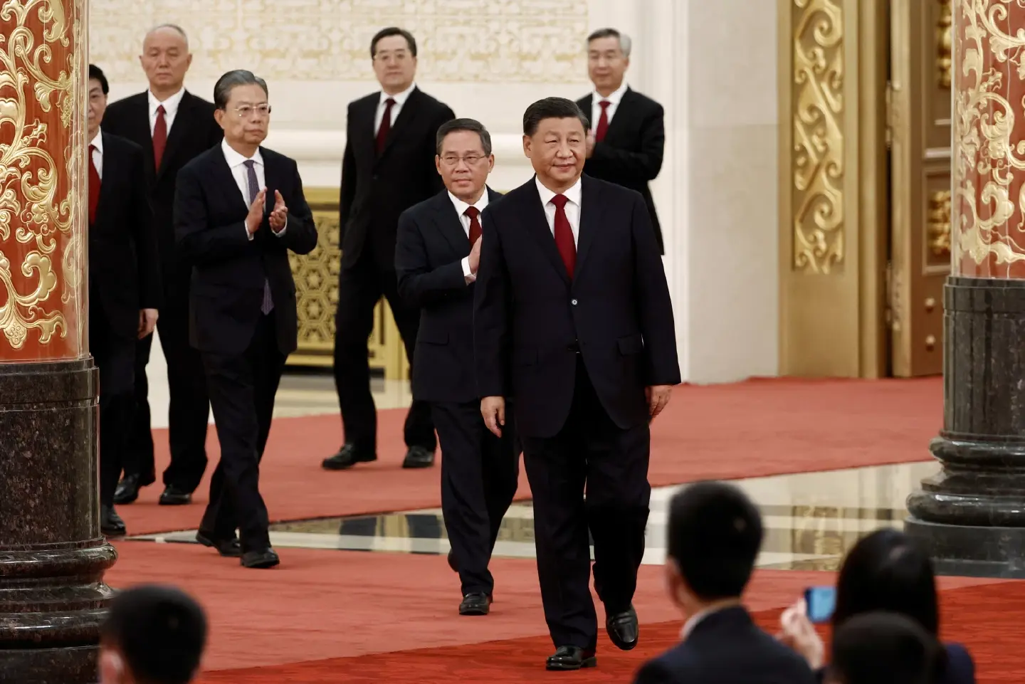 China’s Xi takes helm for 3rd term, backed by leadership team stacked with allies