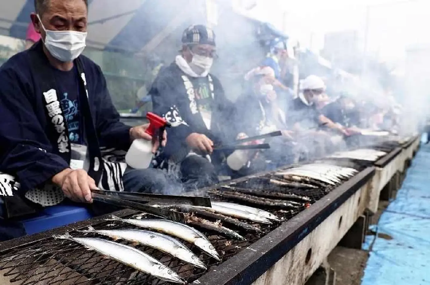 Gratitude for tsunami aid sizzles at Tokyo grilled fish festival