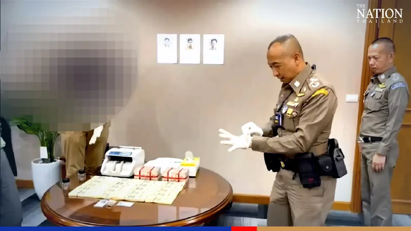 Two Thais arrested in Nonthaburi with 9,000 fake US$100 notes after sting operation