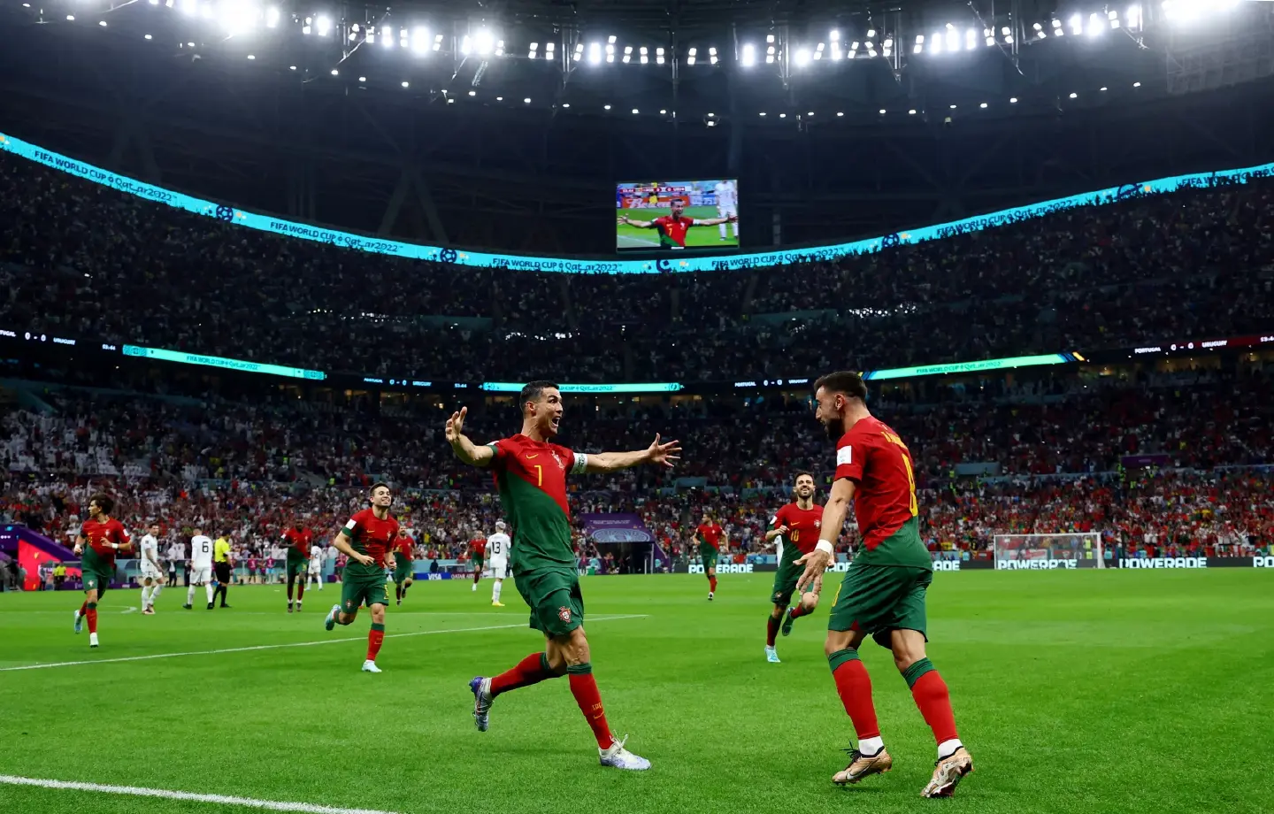 Fernandes double sends Portugal through to World Cup last 16 Fernandes double sends Portugal through to World Cup last 16