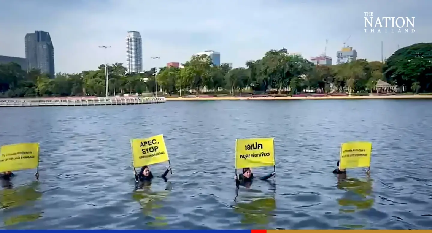 Activists jump in Benjakitti pond to warn against greenwashing policies