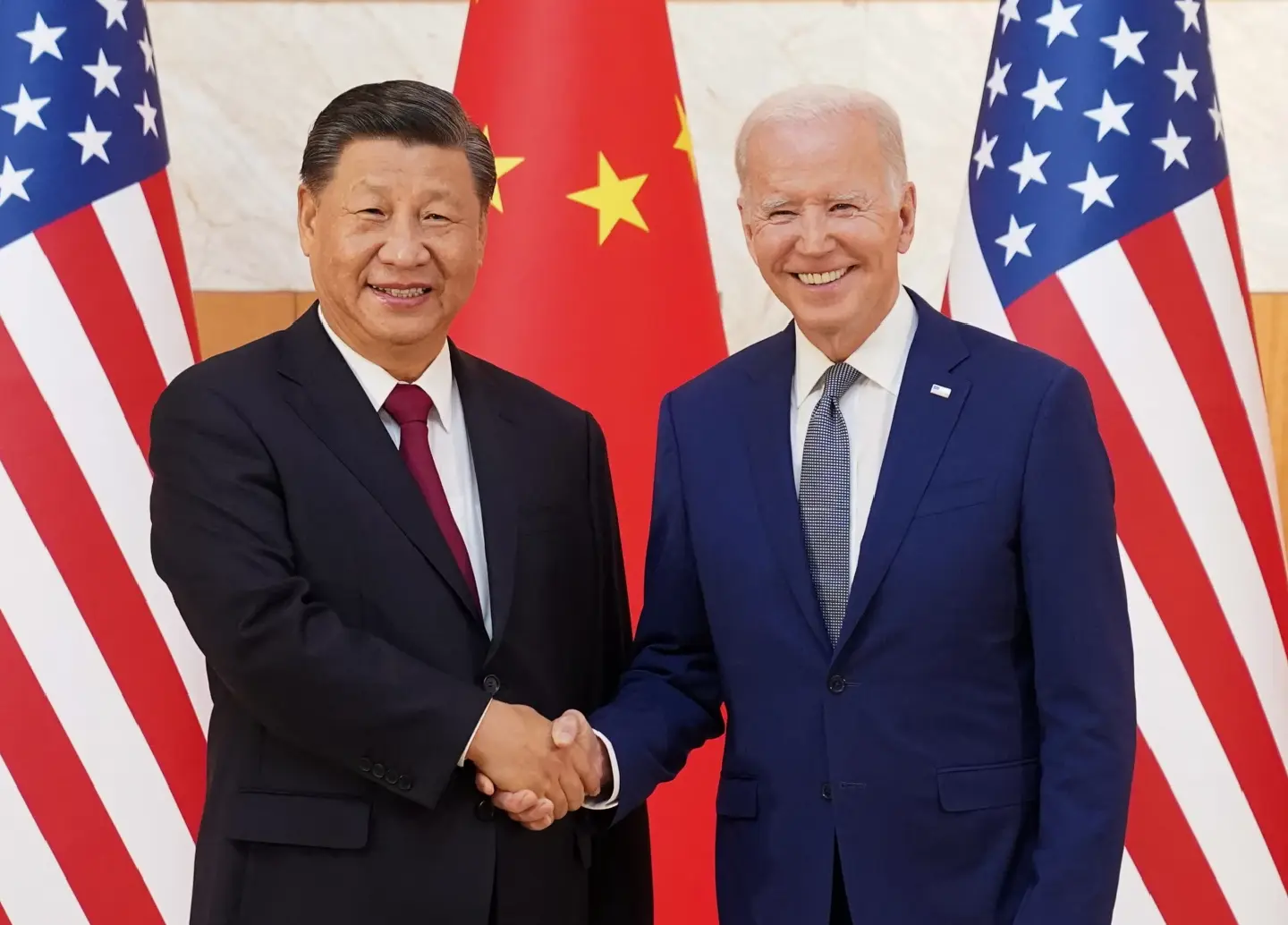 Xi, Biden pledge to continue candid exchange of views