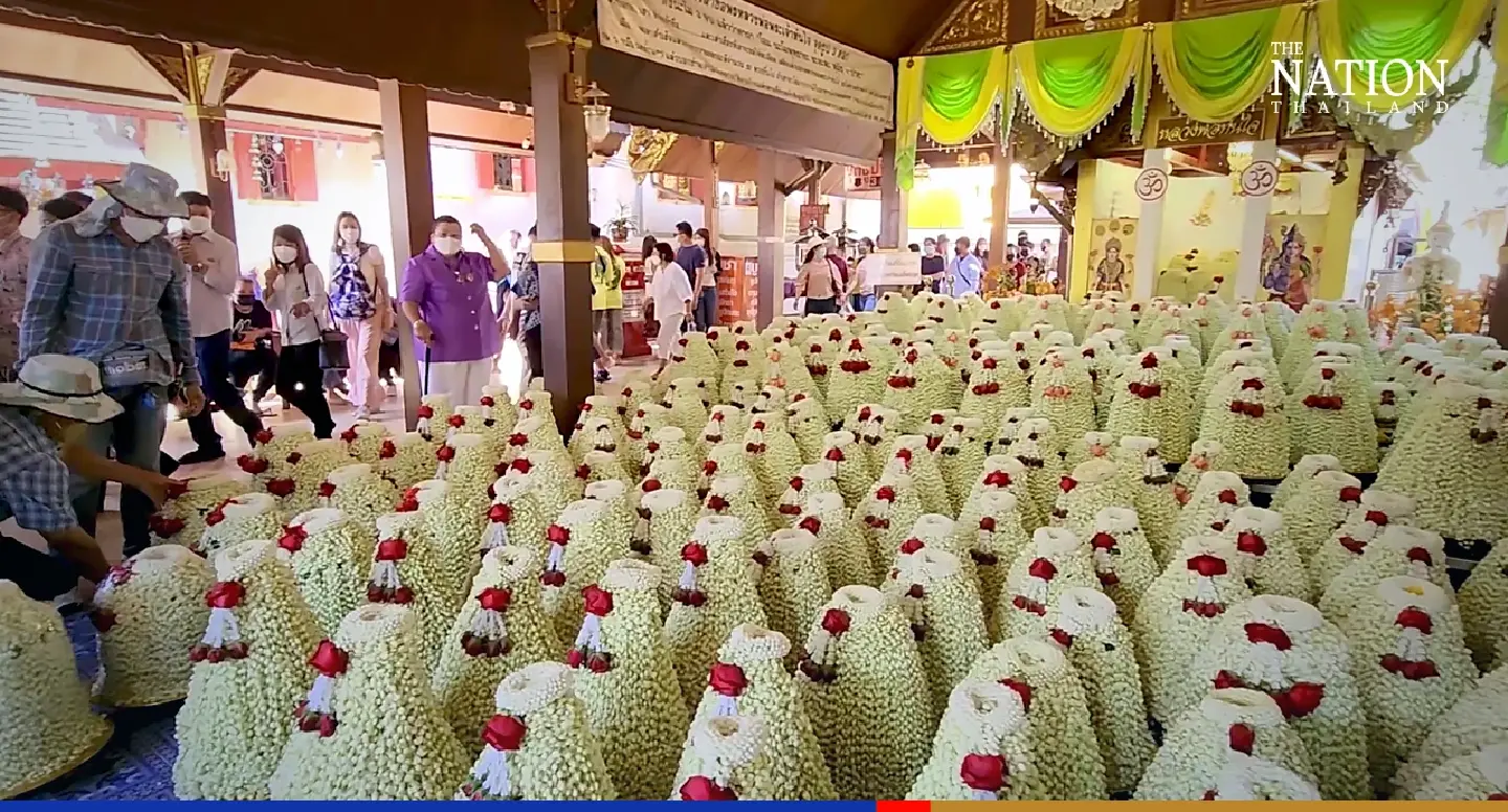 Devotee showers 429,000 garlands on Buddha idol in Chiang Mai to fulfil vow